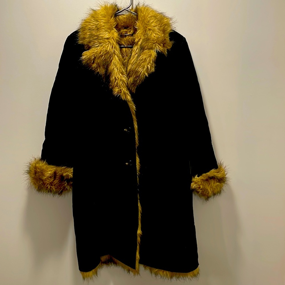 Black leather coat lined with faux fur